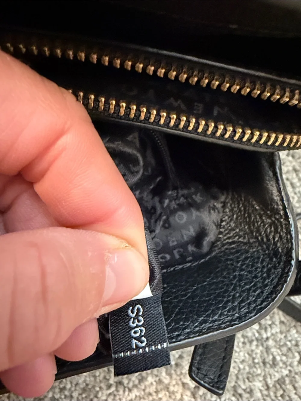 Kate Spade Black Pebbled Leather- handbag w/ three separate compartments,